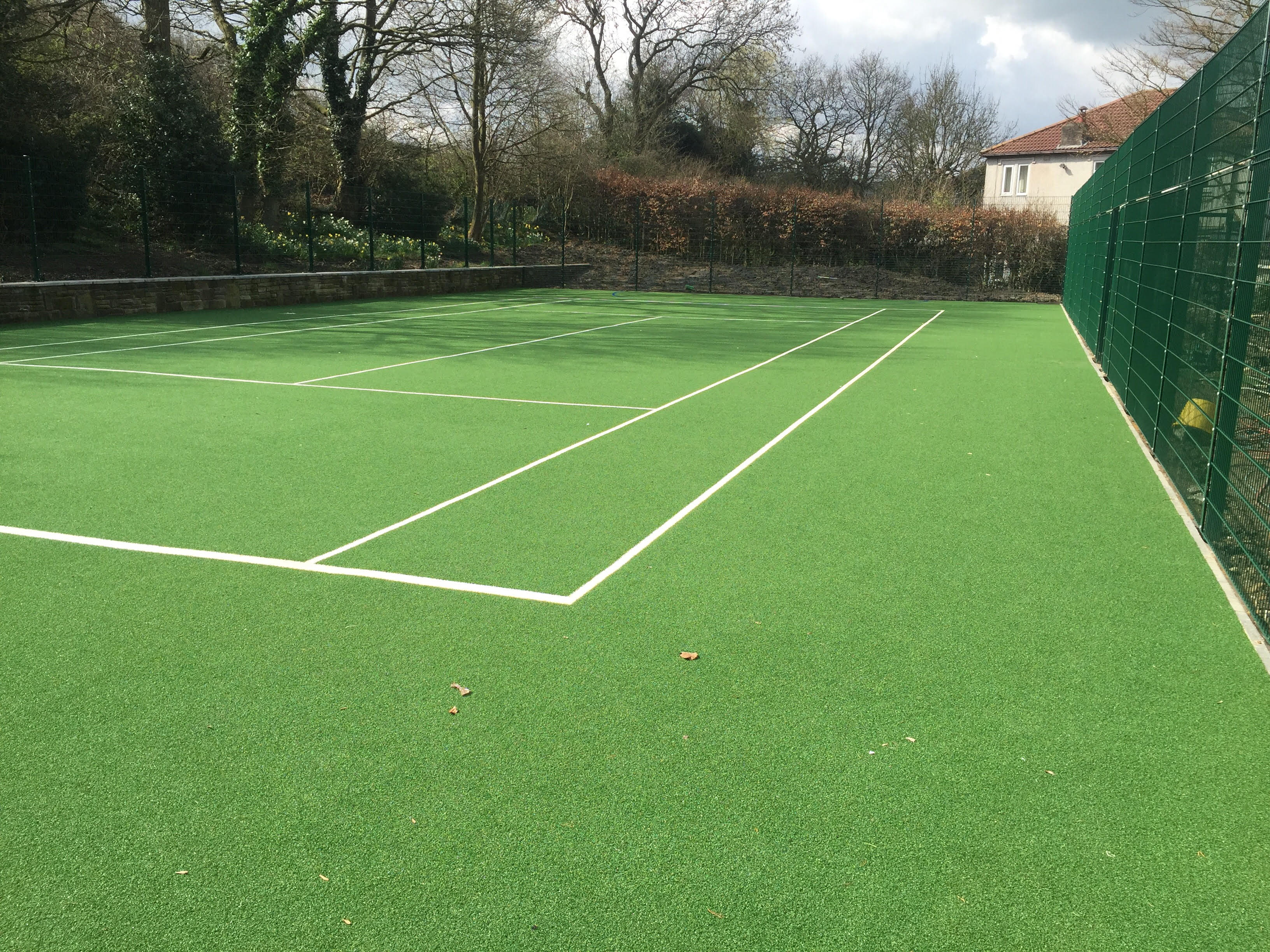 Tennis court build for house extension